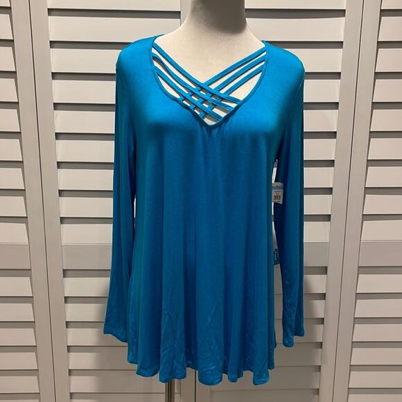 Rain Tops - Rain NWT long Sleeve Top with front straps detail in a Royal Blue.